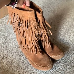 Tall brown fringe boots